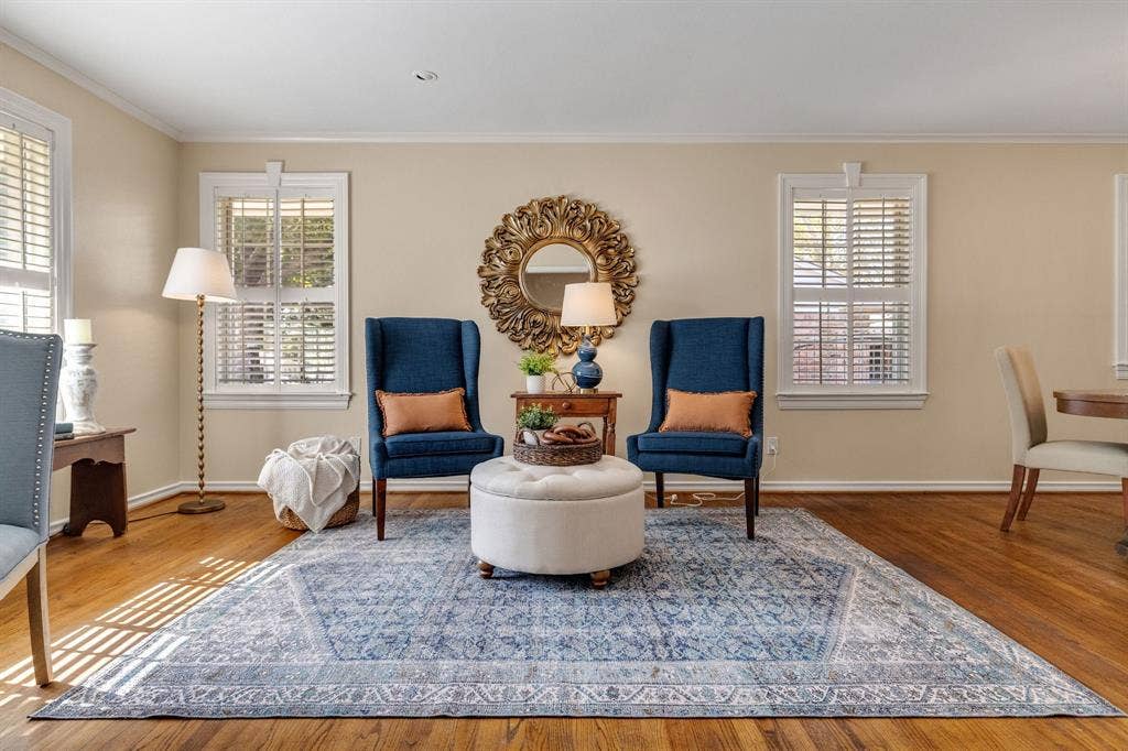 824 Westwood Drive, Richardson, TX 75080 A beautiful room with custom window trim, plantation shutters, wood floors and tons of natural light.