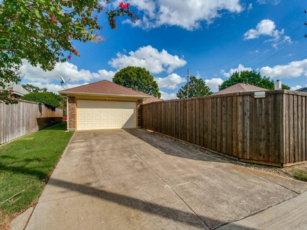 714 Bluebonnet Drive, Allen, TX 75002 Large driveway accessed by alley.