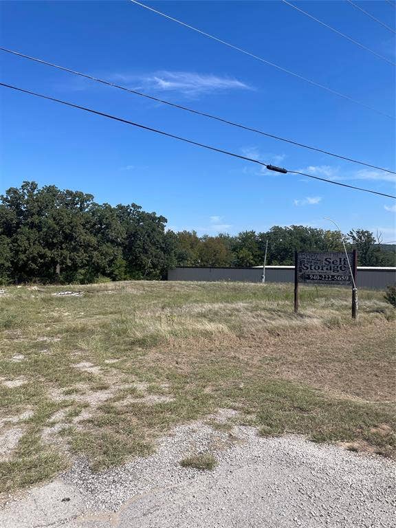9990 Mineral Wells Highway, Weatherford, TX 76088 acreage next to storage units. There is a concrete slap. no guarranties as to condition