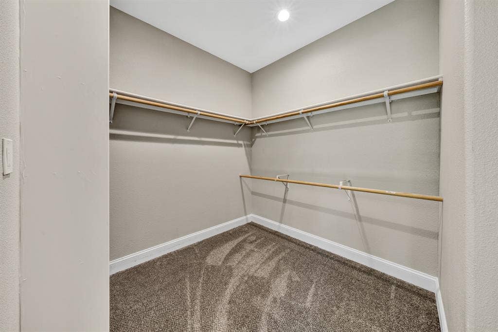 Spacious Walk In Closet with Primary Bedroom