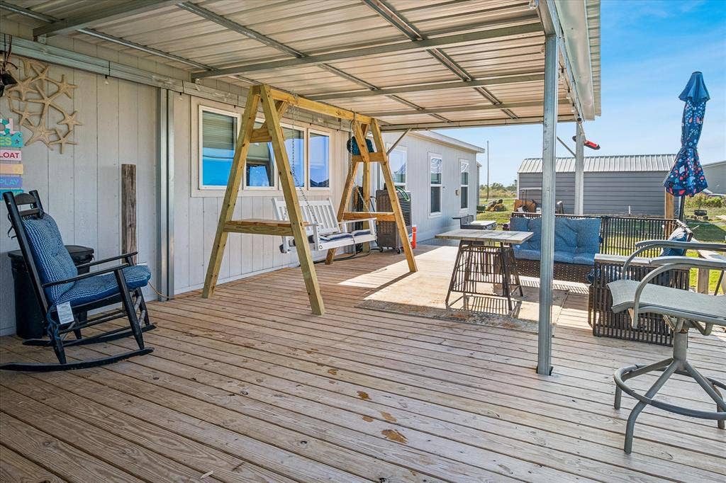 Backyard deck and covered patio.