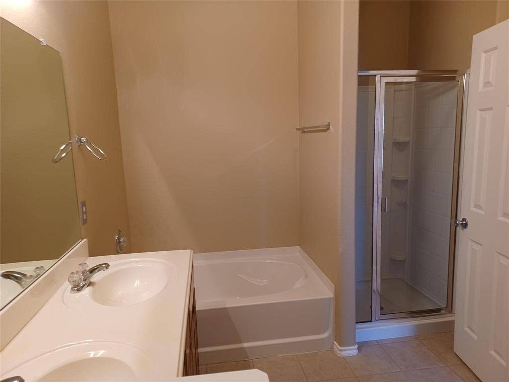 Dual vanity with integral sinks, cultured marble countertop, and chrome faucets