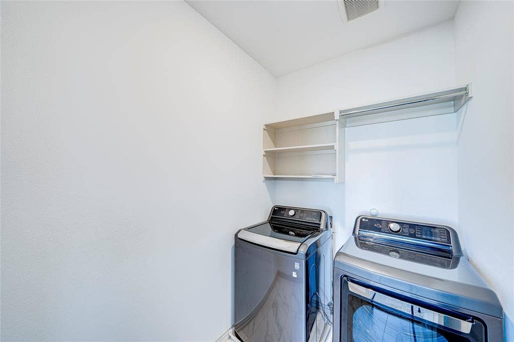 8888 Samara Street, Frisco, TX 75035 Laundry area with built-in shelving and clothes rod