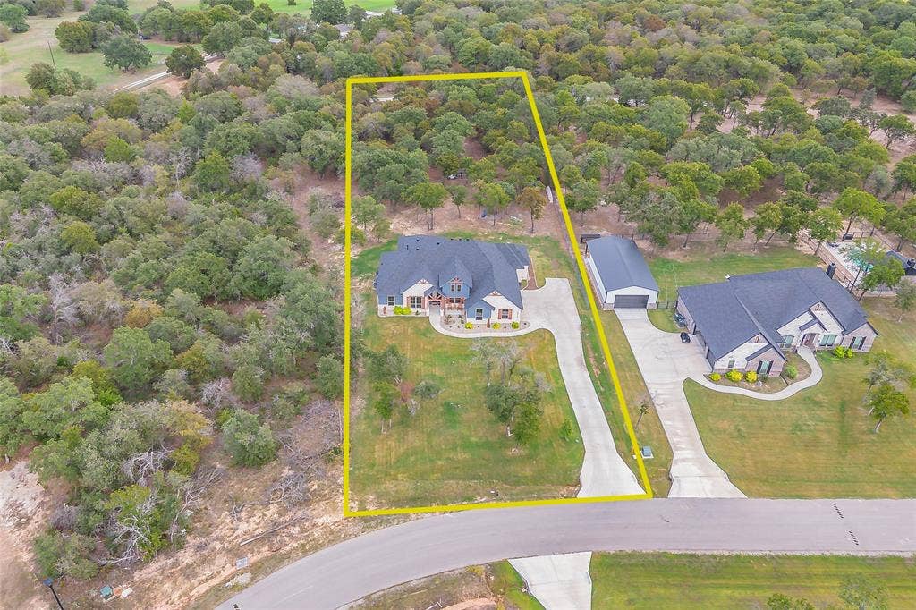This gives you some idea of how far back the property goes. It's 2-acre lot, and this is an "estimate" of the way the property runs.