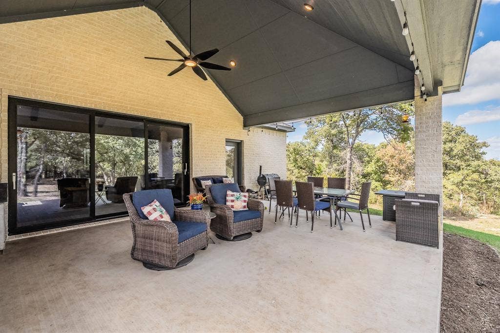 The 3 slider doors lead directly into the living room and the door you see on the right, leads to one of the baths. for convenience.