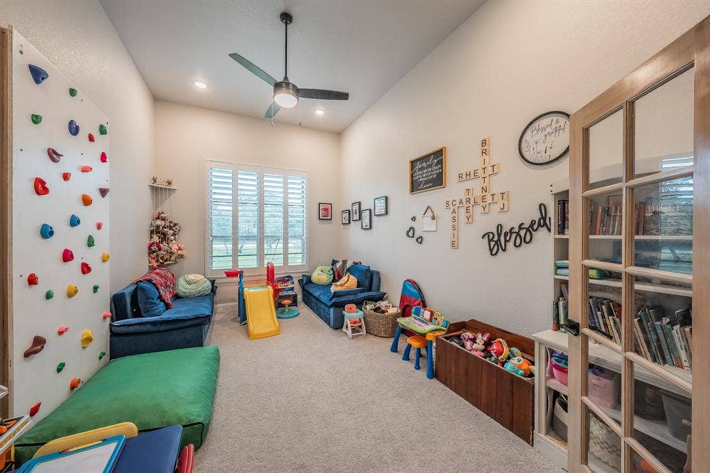 Flex Room with double doors is being used as the children's play room.  It could easily be a craft room or home gym.
