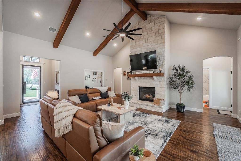 Hand-scraped hardwood flooring gives this home the warmth it demands.