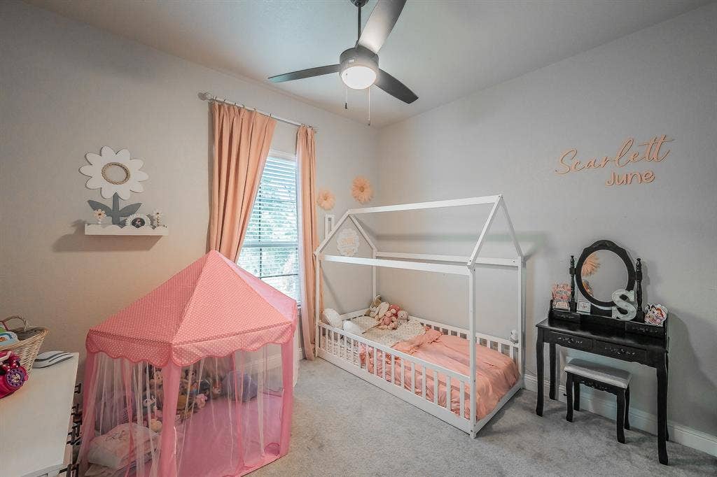 Precious bedroom with custom closet, and nearby bath.