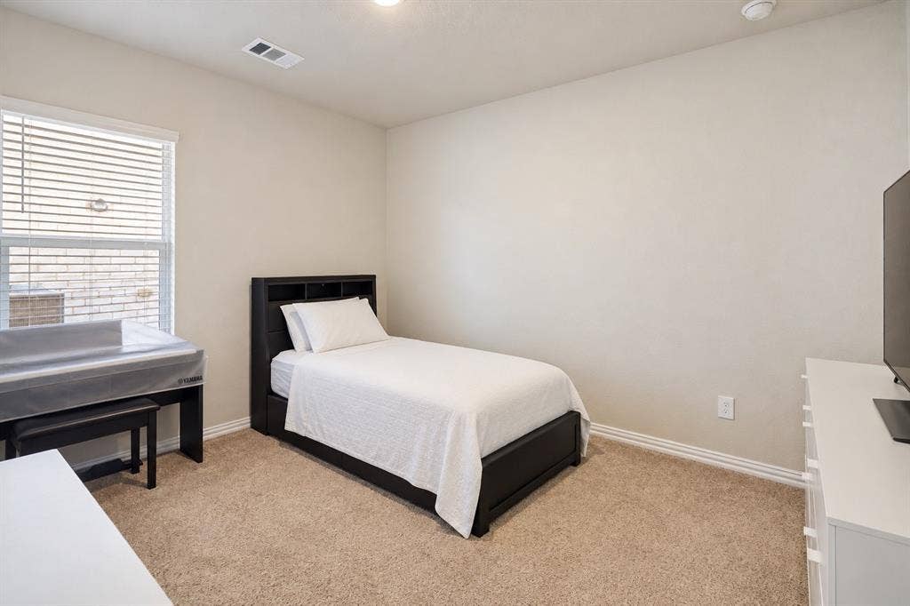 753 Poppy Lane, Lavon, TX 75166 Neutral-toned interior featuring wall-to-wall carpeting, window with slatted blinds, and recessed lighting