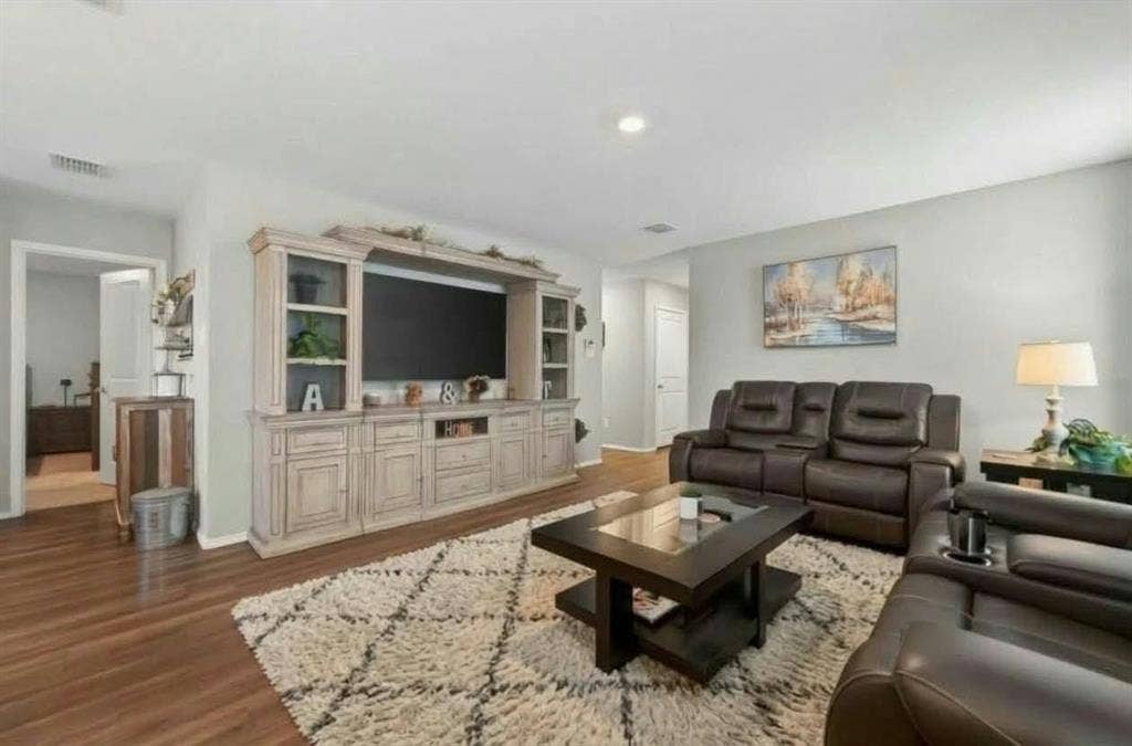 554 Deerfern Drive, Princeton, TX 75407 Wood-finish flooring throughout, light-toned walls, and a recessed ceiling light fixture