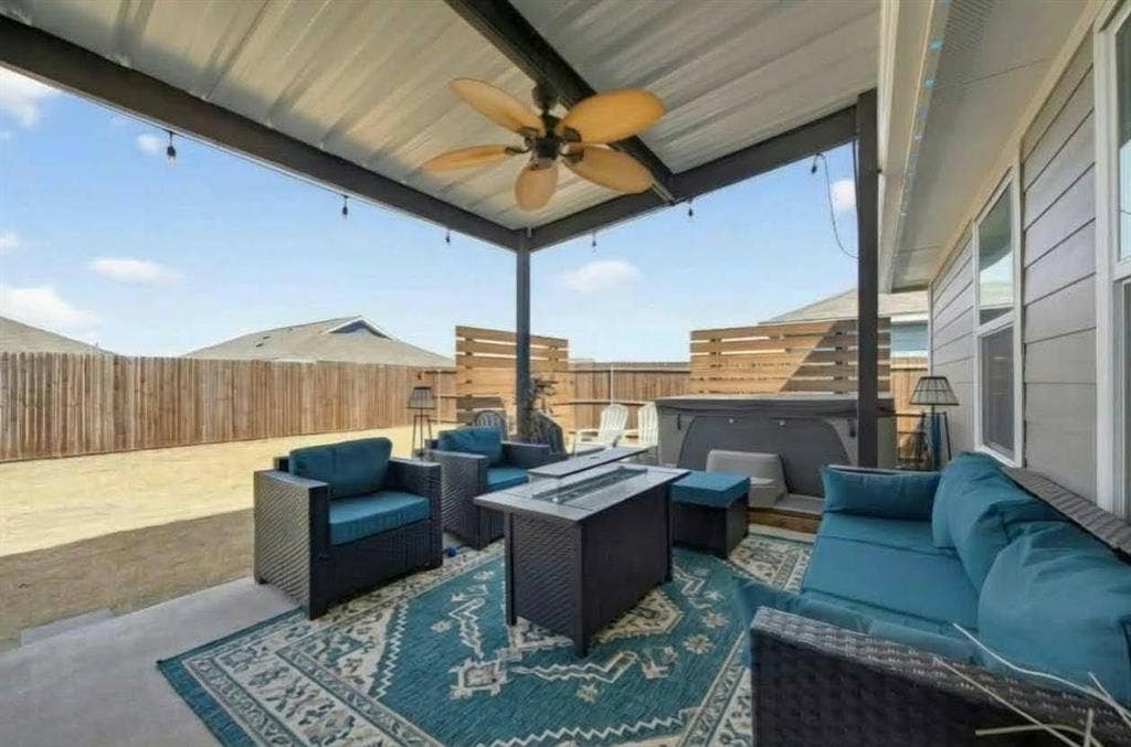 554 Deerfern Drive, Princeton, TX 75407 Covered patio with a metal roof and a ceiling fan