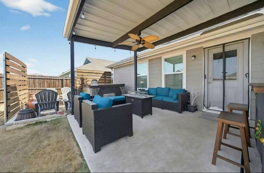 554 Deerfern Drive, Princeton, TX 75407 Covered patio featuring a ceiling fan, string lighting, and direct exterior access
