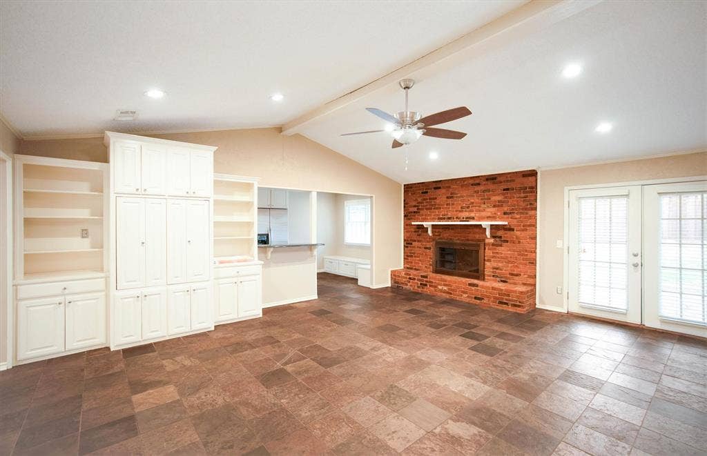 5 Ridgeview Circle, Richardson, TX 75080 Spacious second living room with ceiling fan, fireplace, and built-ins