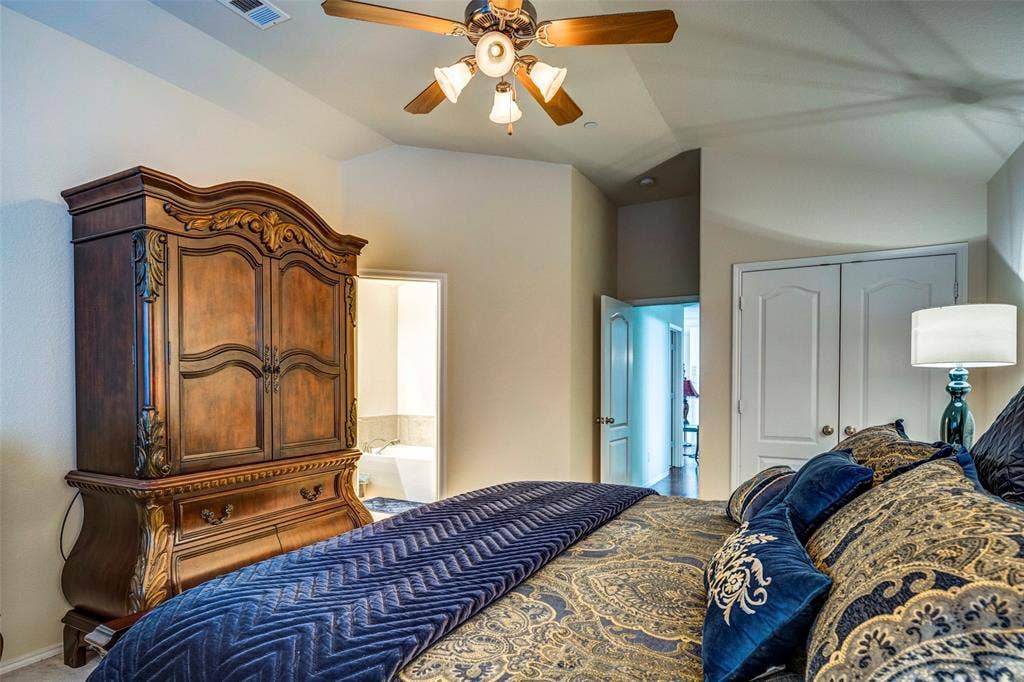 1040 Lucy Lane, Allen, TX 75013 Vaulted ceiling with an attached ceiling fan and light fixture