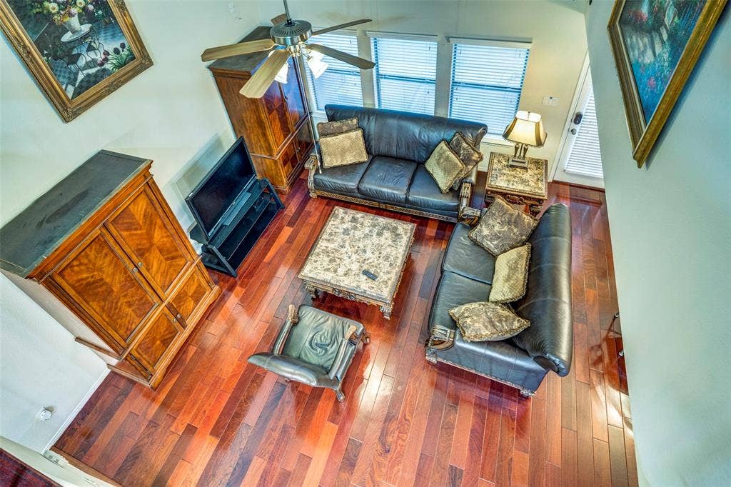 1040 Lucy Lane, Allen, TX 75013 Wood-finish flooring throughout, with a ceiling fan