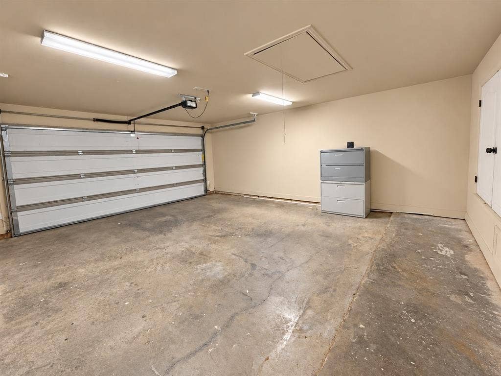 Attached overhead garage door with opener