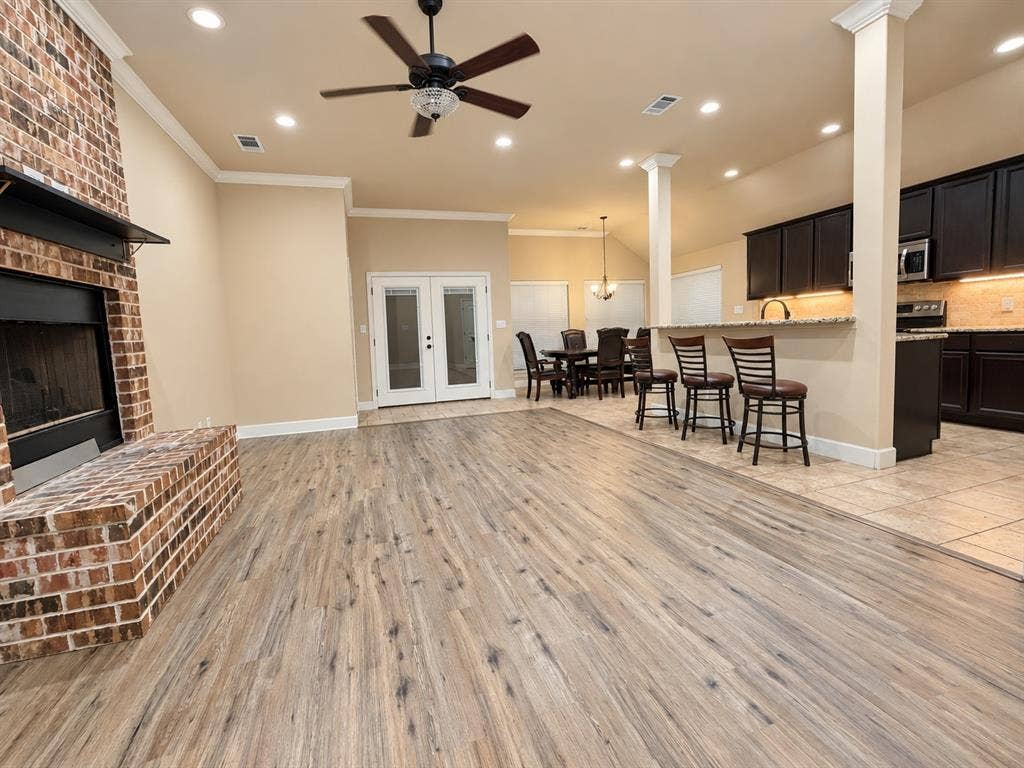 Wood-finish flooring throughout the living space