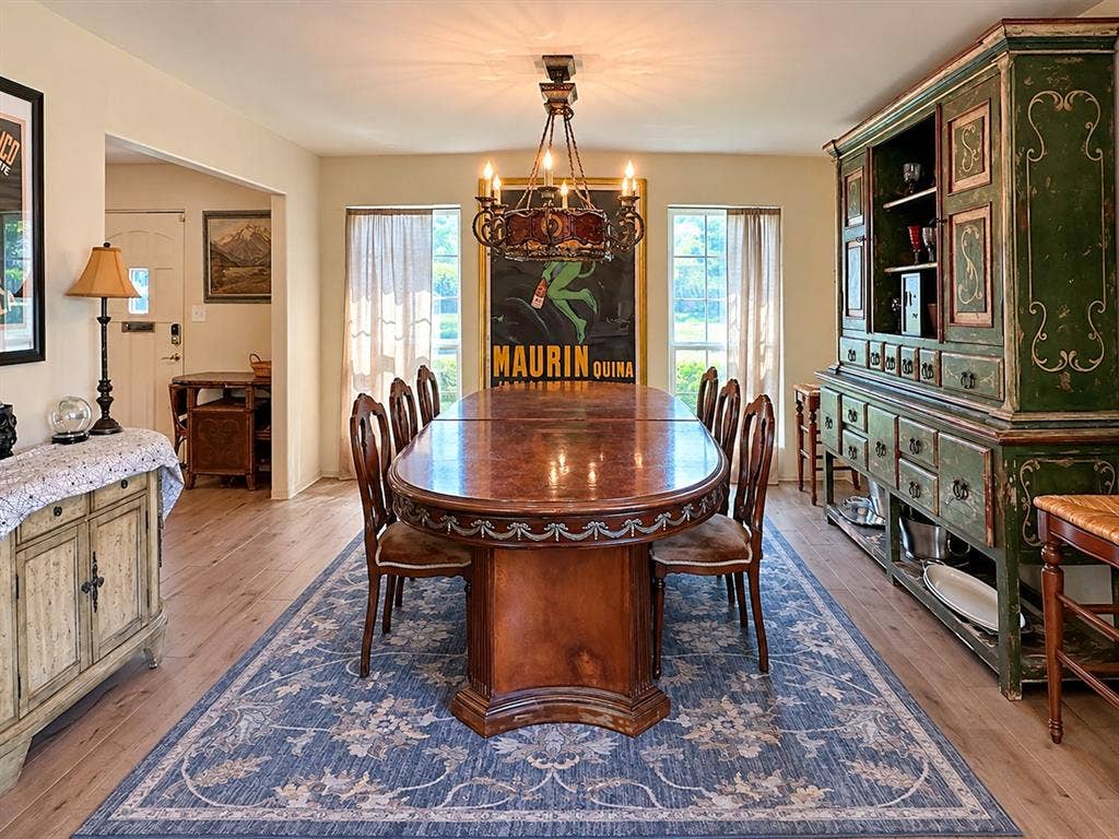 10734 Candlewood Drive, Houston, TX 77042 Light wood-finish flooring with a large area rug