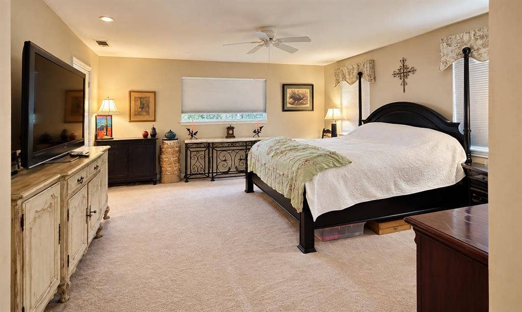 10734 Candlewood Drive, Houston, TX 77042 Carpeted flooring, recessed lighting, and a ceiling fan