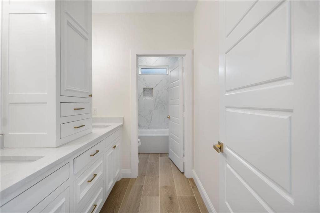 13920 Cedar Hill, Tyler, TX 75704 Dual vanity with integrated sinks and white cabinetry
