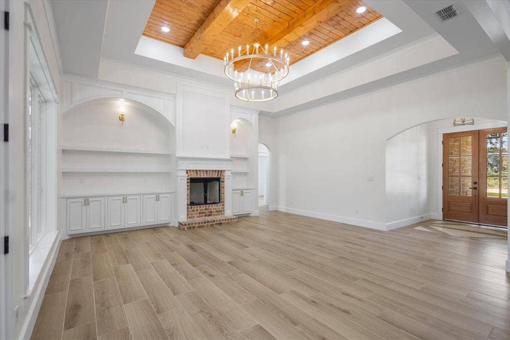 13920 Cedar Hill, Tyler, TX 75704 Vaulted ceiling with wood-finish beams, recessed lighting, and a chandelier