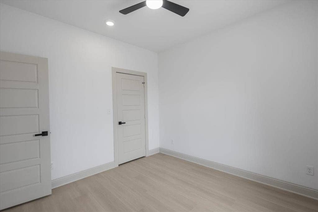 17155 Island Lake Dr., Tyler, TX 75708 Recessed lighting, ceiling fan, five-panel interior doors, modern black hardware, wood-finish flooring