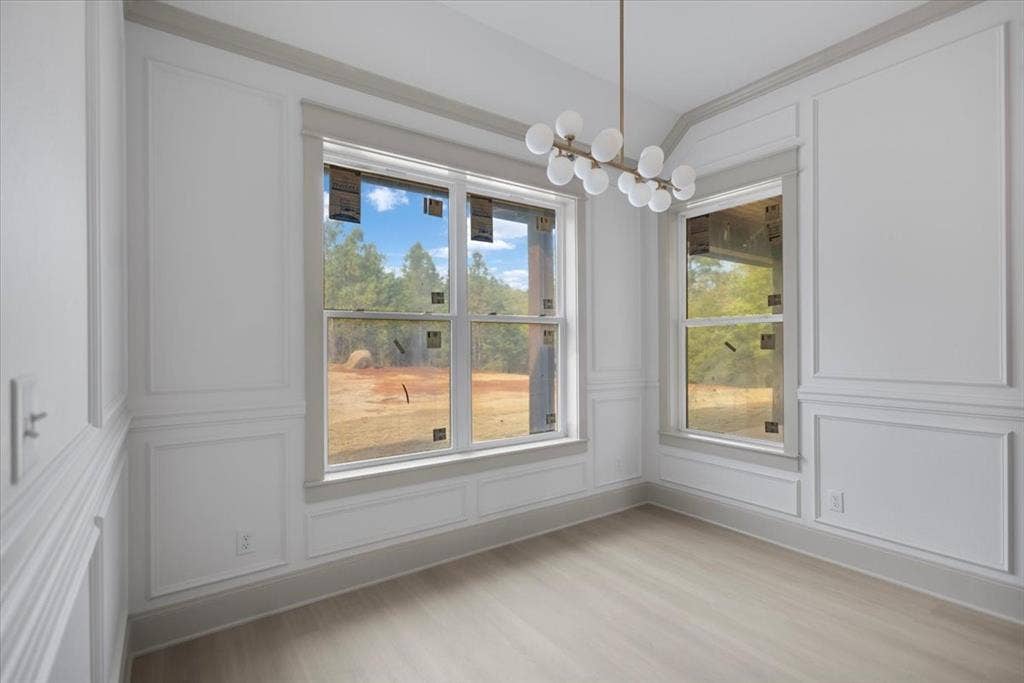 17155 Island Lake Dr., Tyler, TX 75708 Wood-finish flooring with elegant wainscoting and crown molding