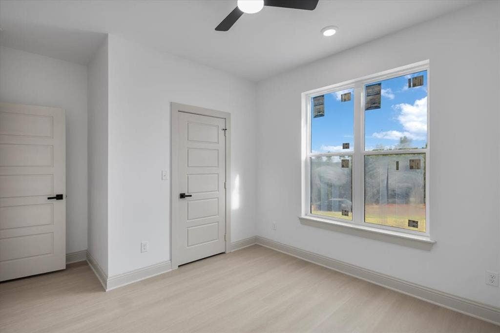 17155 Island Lake Dr., Tyler, TX 75708 Recessed lighting, wood-finish flooring, ceiling fan, and panel doors with matte black hardware