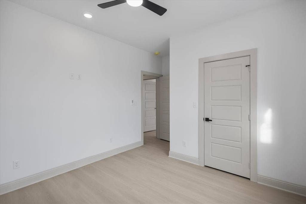 17155 Island Lake Dr., Tyler, TX 75708 Recessed lighting, wood-finish flooring, ceiling fan, solid core door, and neutral paint palette