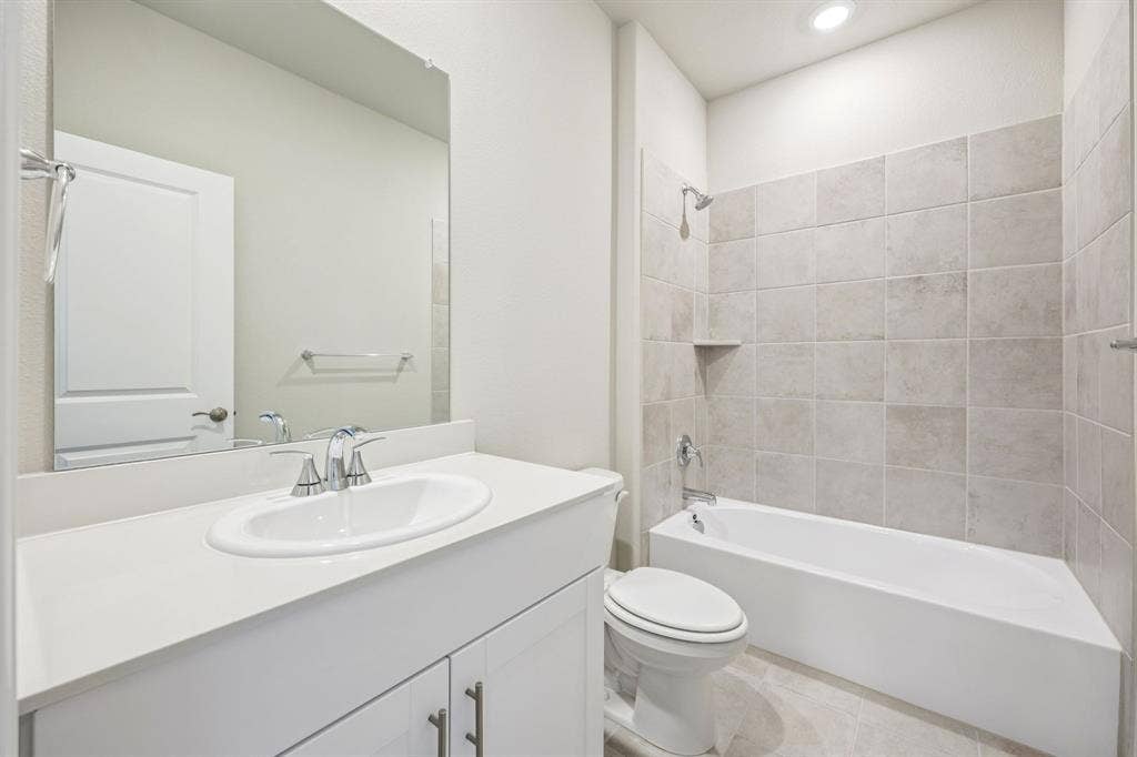 412 Watertown Drive, Princeton, TX 75071 Photo is not of the actual home, but is an inspirational photo of builder’s model home and may depict options, furnishings, and/or decorator features that are not included.