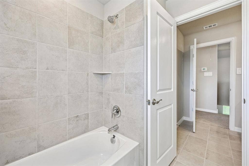 412 Watertown Drive, Princeton, TX 75071 Photo is not of the actual home, but is an inspirational photo of builder’s model home and may depict options, furnishings, and/or decorator features that are not included.