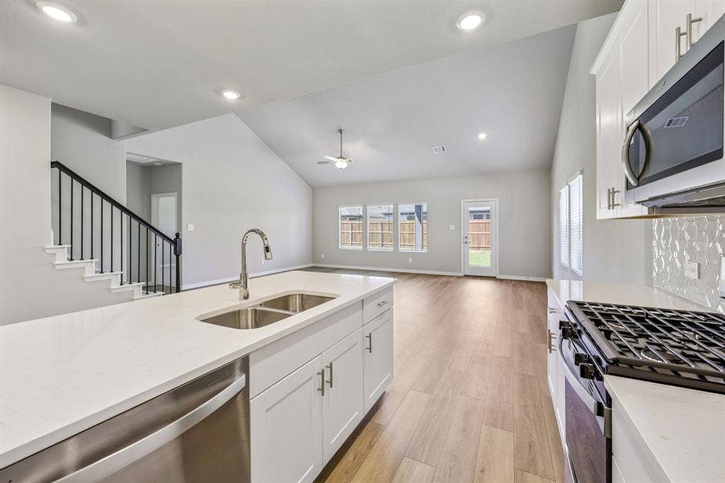 412 Watertown Drive, Princeton, TX 75071 Photo is not of the actual home, but is an inspirational photo of builder’s model home and may depict options, furnishings, and/or decorator features that are not included.