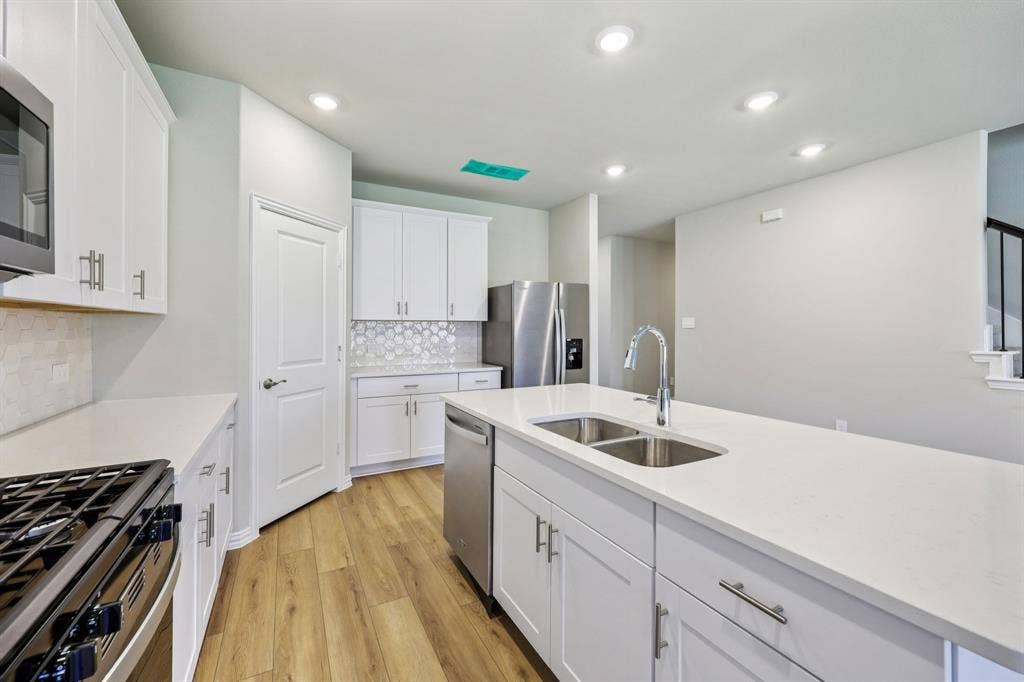 412 Watertown Drive, Princeton, TX 75071 Photo is not of the actual home, but is an inspirational photo of builder’s model home and may depict options, furnishings, and/or decorator features that are not included.