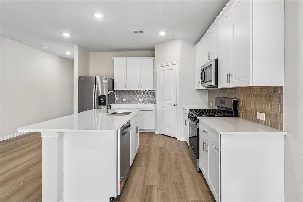 1206 Morrell Drive, Princeton, TX 75071 Photo is not of the actual home, but is an inspirational photo of builder’s model home and may depict options, furnishings, and/or decorator features that are not included.