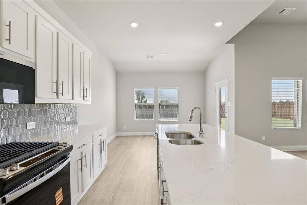 3858 Austin Drive, Farmersville, TX 75442 Photo is not of the actual home, but is an inspirational photo of builder’s model home and may depict options, furnishings, and/or decorator features that are not included.