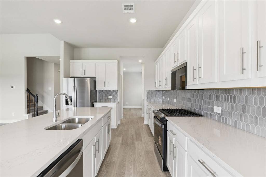 3858 Austin Drive, Farmersville, TX 75442 Photo is not of the actual home, but is an inspirational photo of builder’s model home and may depict options, furnishings, and/or decorator features that are not included.