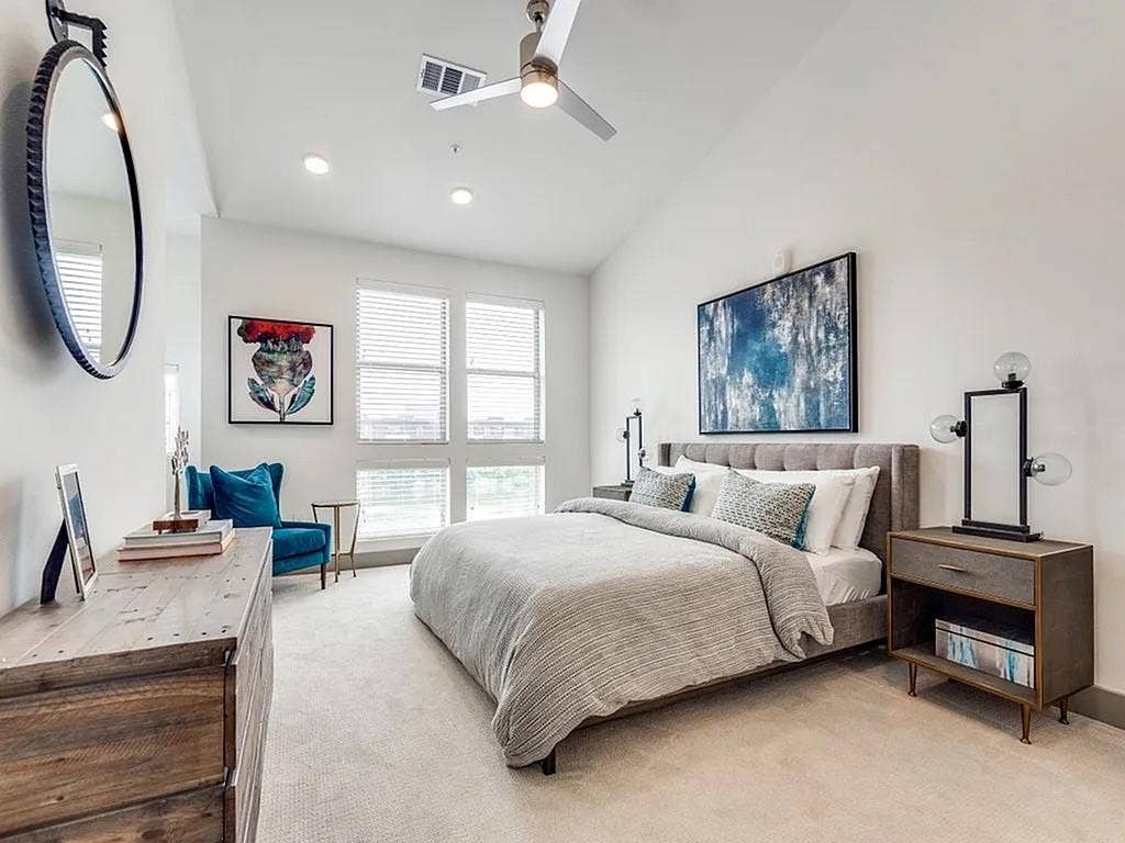 4020 McEwen Road, #9121, Farmers Branch, TX 75244 Carpeted bedroom with vaulted ceiling, ceiling fan, and recessed lighting