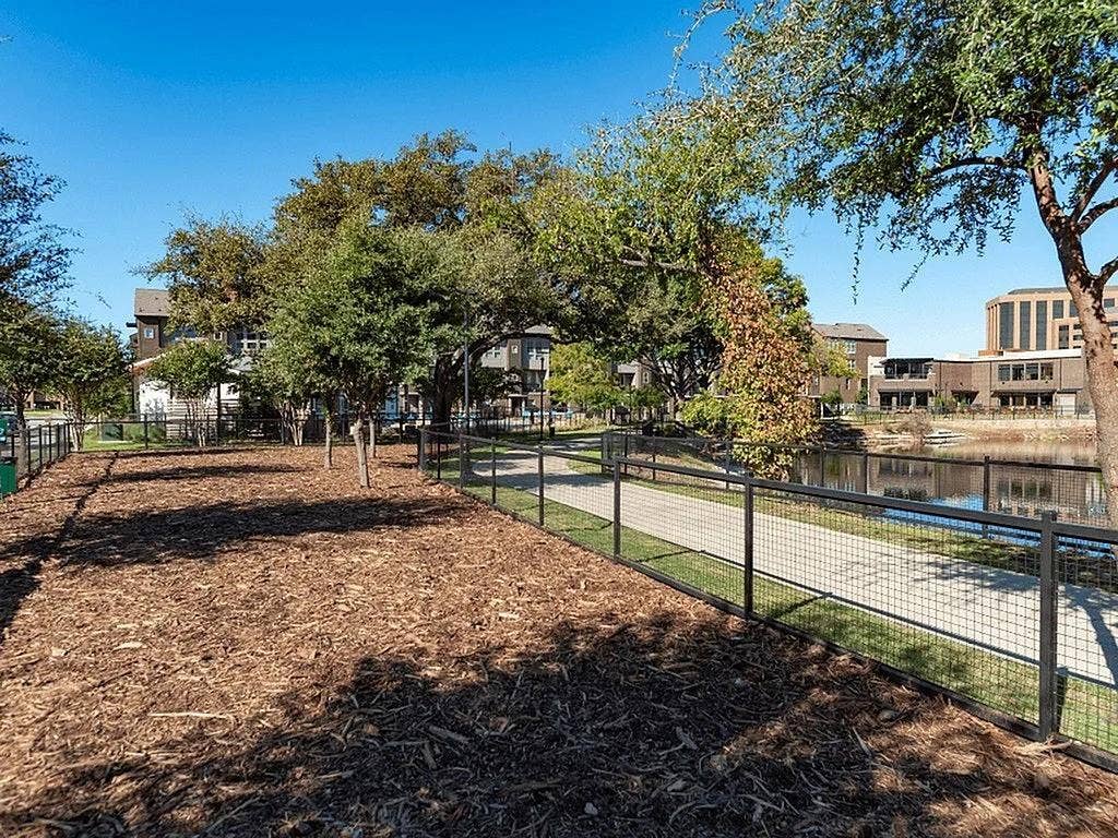4020 McEwen Road, #9121, Farmers Branch, TX 75244 View of property's community with a water view