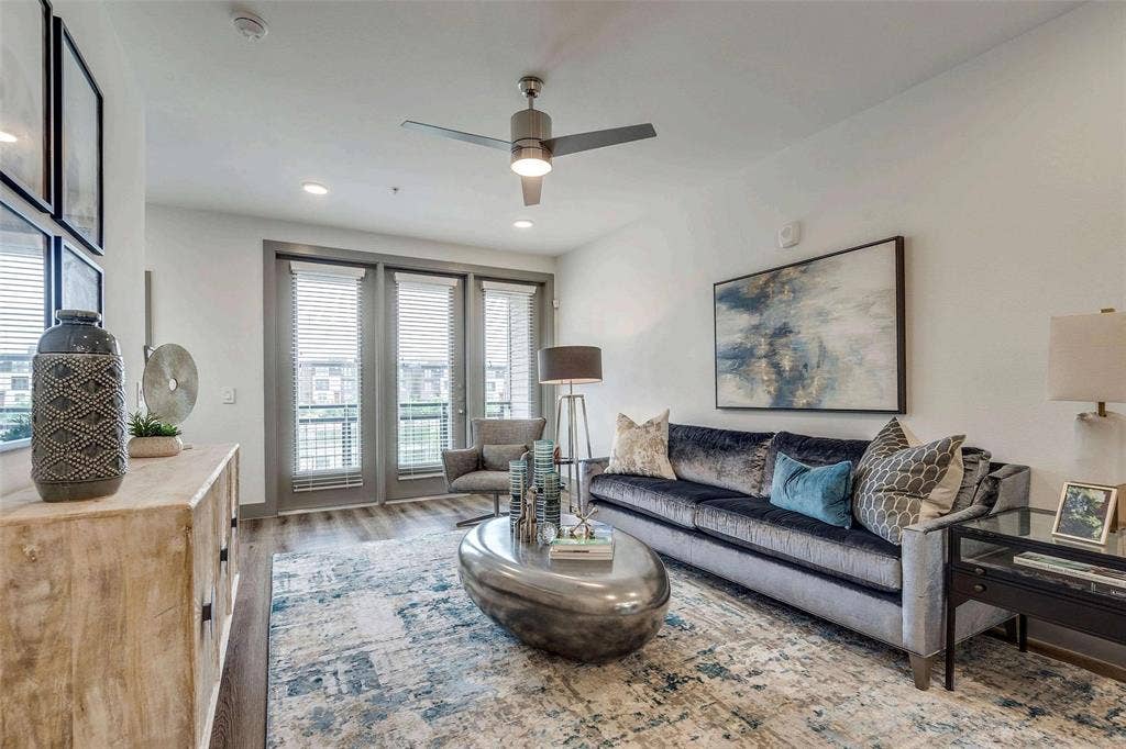 4020 McEwen Road, #9121, Farmers Branch, TX 75244 Living room featuring wood finished floors, a ceiling fan, and recessed lighting