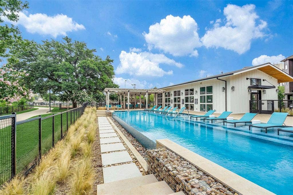 4020 McEwen Road, #9121, Farmers Branch, TX 75244 Community pool with a patio