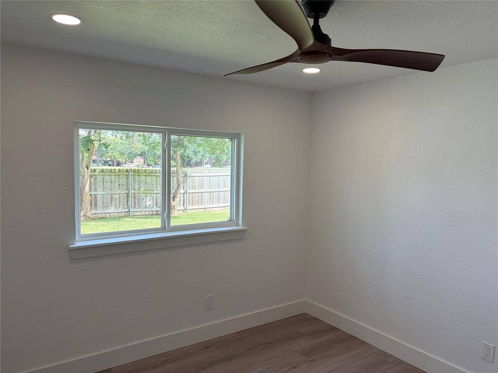 1006 Heritage Drive, Garland, TX 75043 Guest Room with Ceiling Fan