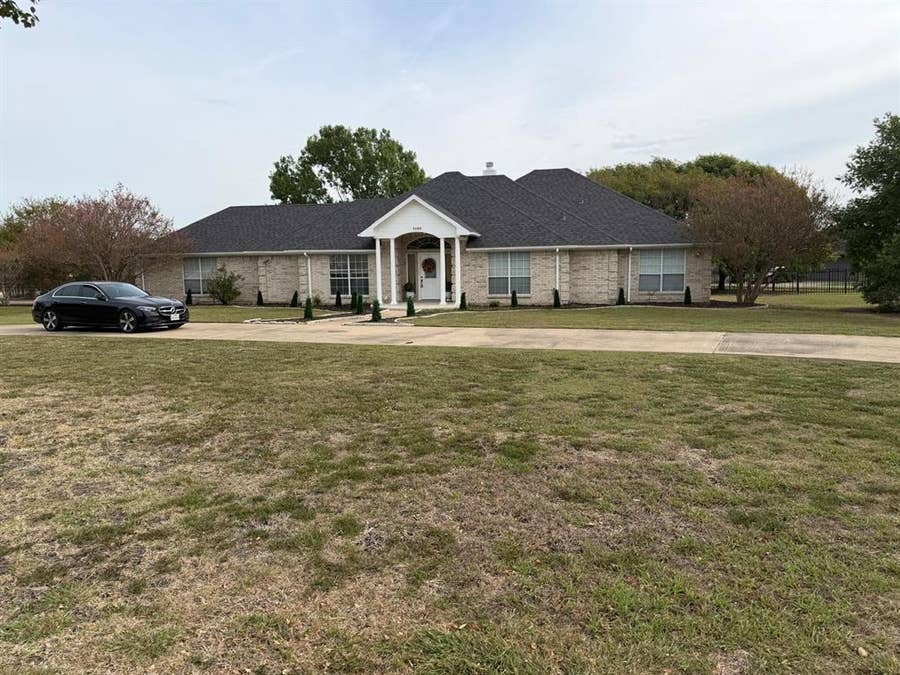 Property photo for 1165 E Oaklawn Drive, Talty, TX