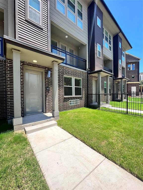 4020 McEwen Road, #8115, Farmers Branch, TX 75244 Multi-story facade featuring brick and horizontal siding