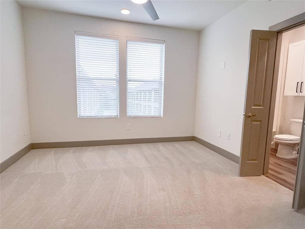 4020 McEwen Road, #8115, Farmers Branch, TX 75244 Spare room with light carpet and recessed lighting