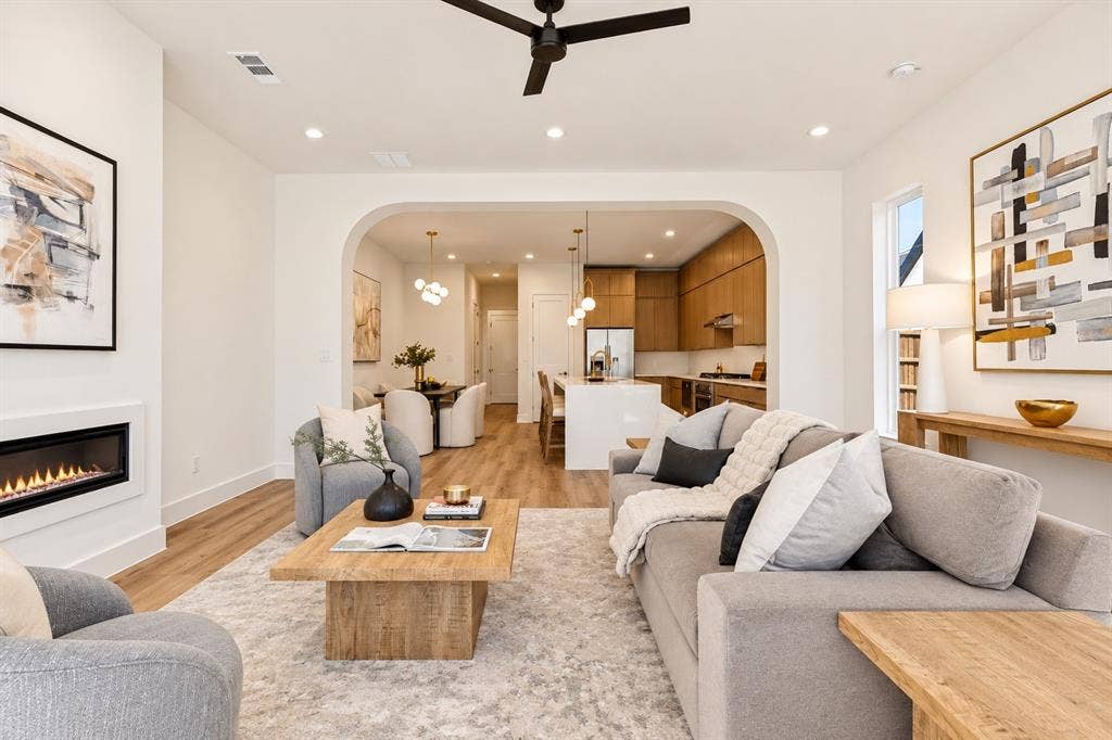 903 Bayonne Street, Dallas, TX 75212 Living area with wood-finish flooring, recessed lighting, and an integrated fireplace