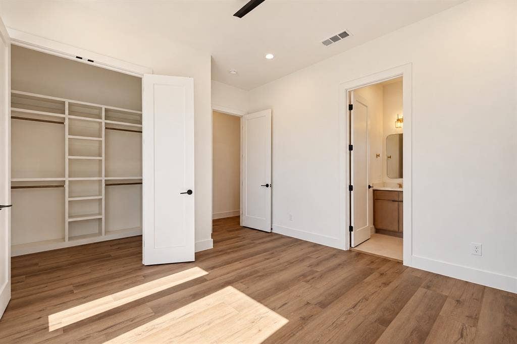 903 Bayonne Street, Dallas, TX 75212 Wood-finish flooring, recessed lighting, and a built-in closet system