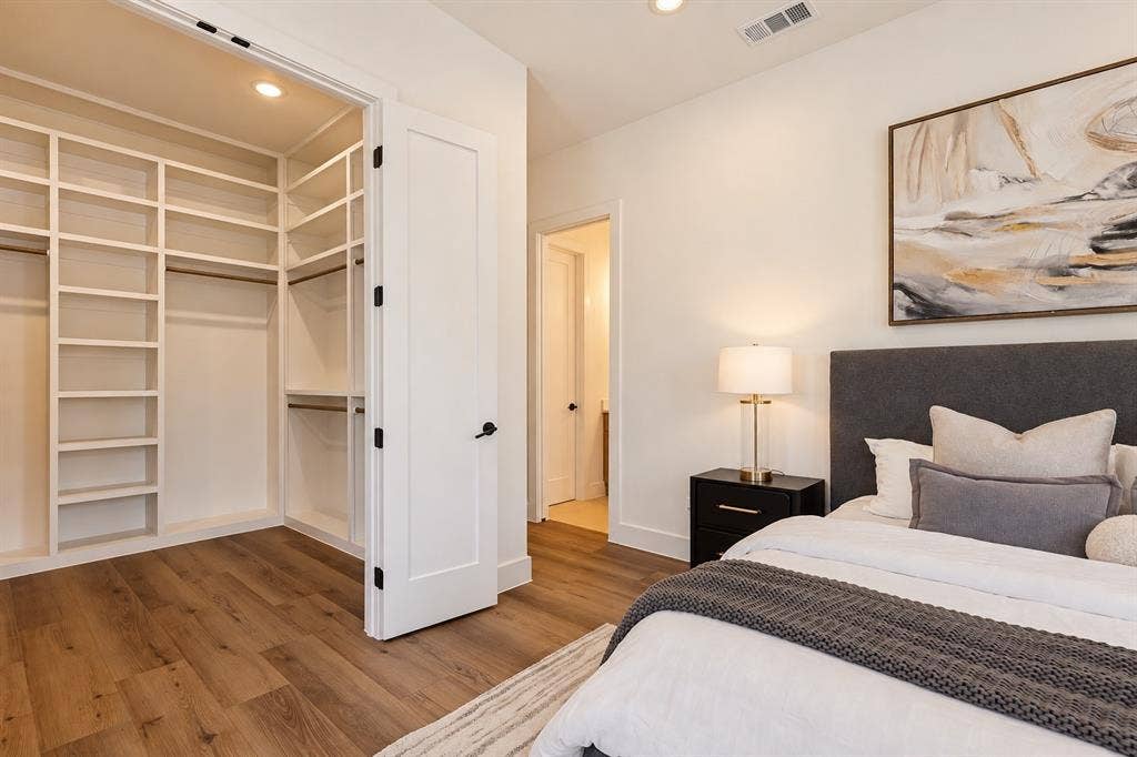 903 Bayonne Street, Dallas, TX 75212 Wood-finish flooring, built-in closet shelving, recessed lighting, and a solid core door with matte black hardware