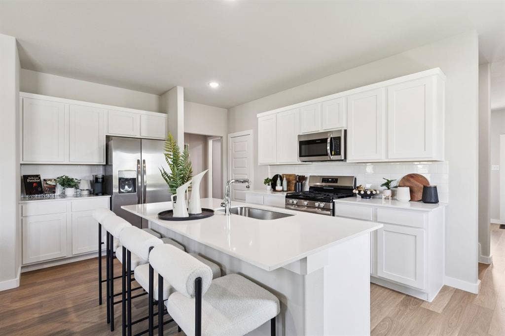 Kitchen in the Magnolia home plan – REPRESENTATIVE PHOTO