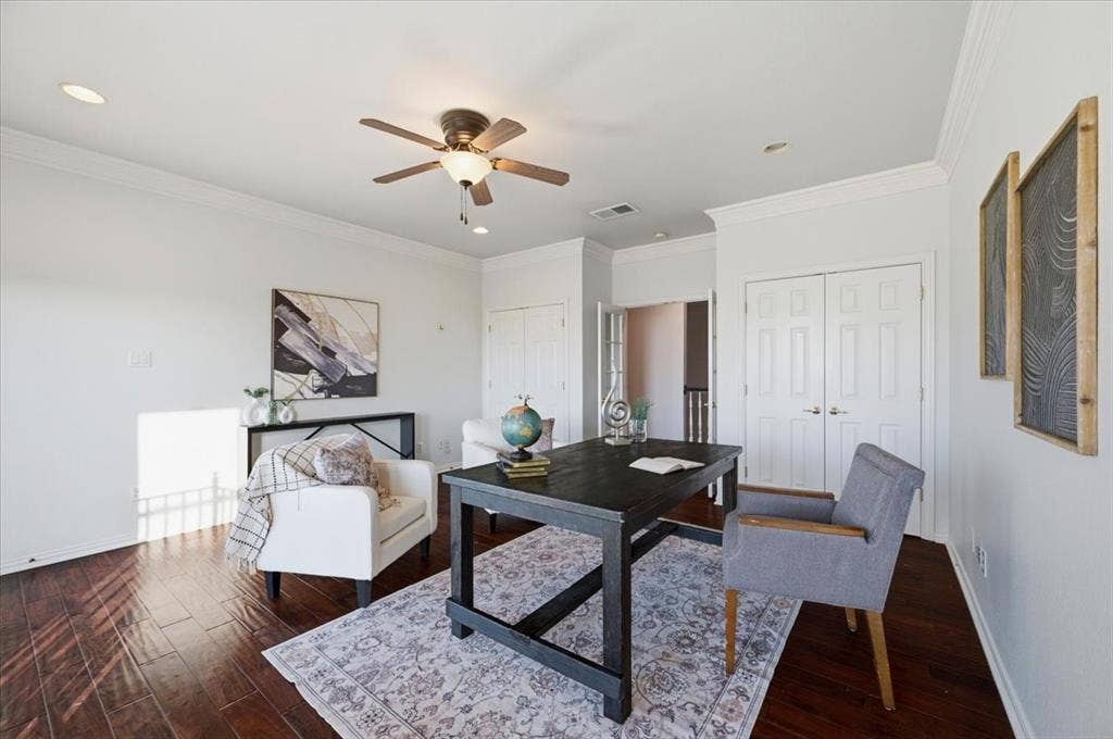 2945 Emerald Sound Drive, Cedar Hill, TX 75104 Wood-finish flooring, recessed lighting, crown molding, and dual-panel closet doors