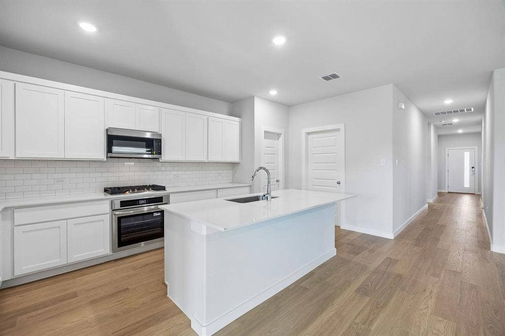 Kitchen in the Oscar home plan – REPRESENTATIVE PHOTO